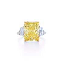 Engagement Ring with a Radiant Yellow Diamond & Side Stones in Platinum & 18K Yellow Gold