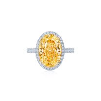 Kwiat Setting Engagement Ring with an Oval Yellow Diamond & Pave in Platinum